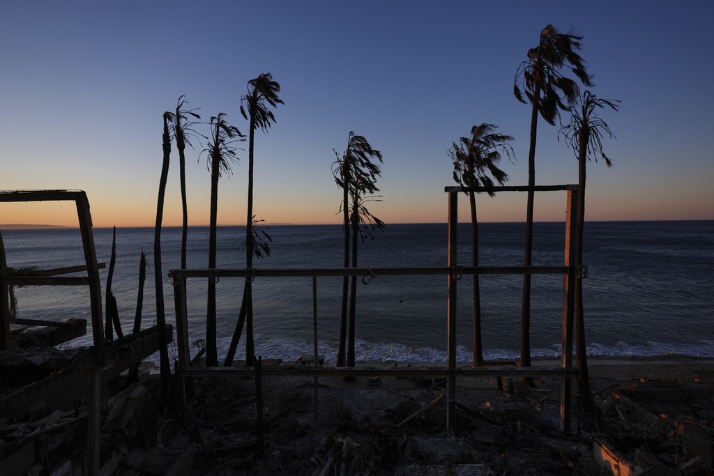 Windy, flame-fanning weather eases up as progress made on LA-area fires