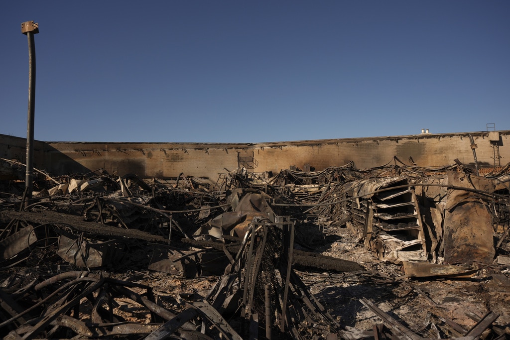 Windy, flame-fanning weather eases up as progress made on LA-area fires