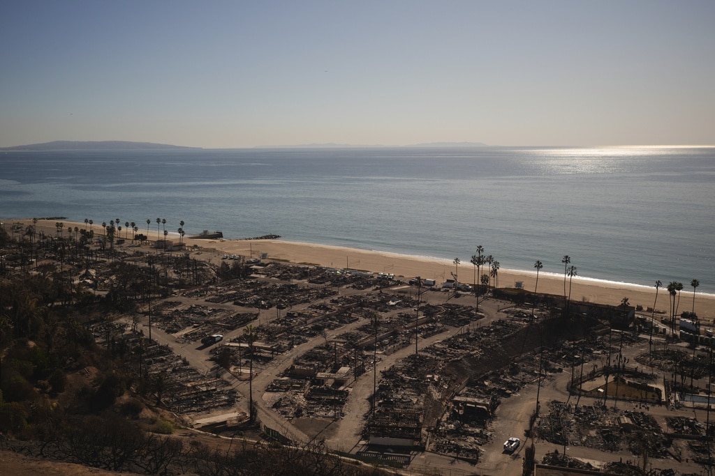 Windy, flame-fanning weather eases up as progress made on LA-area fires