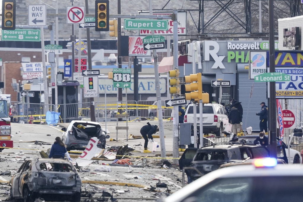 Three people injured on the ground when a jet crashed in a busy Philadelphia neighborhood, killing seven people, remain in critical condition