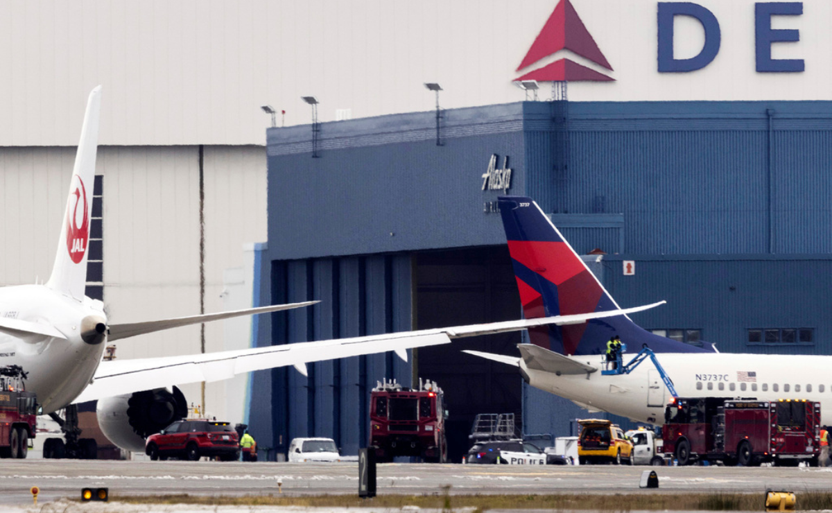 Parked Delta plane clipped by Japan Airlines plane at Seattle airport