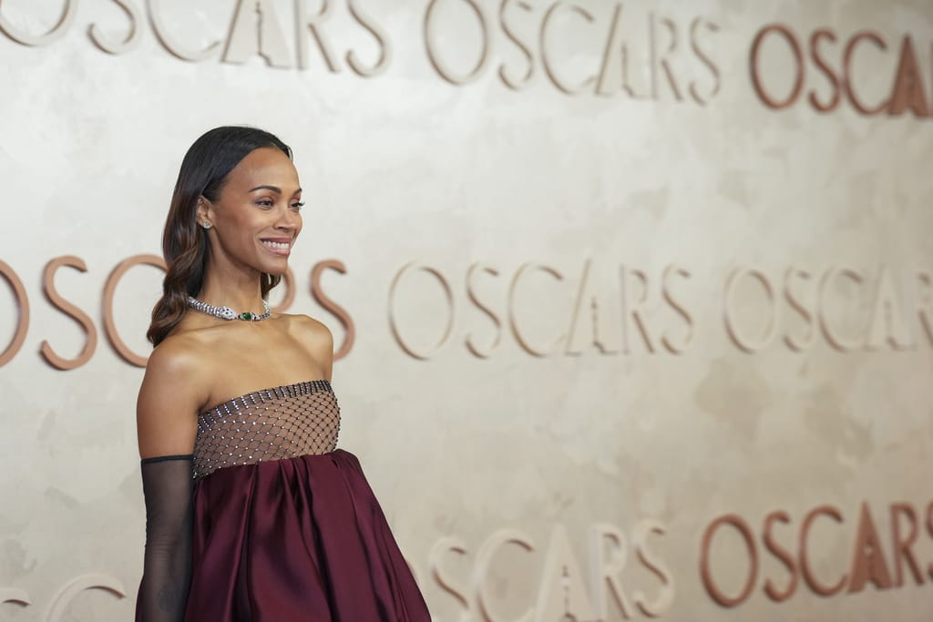 Zoe Saldaña wins first Oscar, sweeping awards season as best supporting actress
