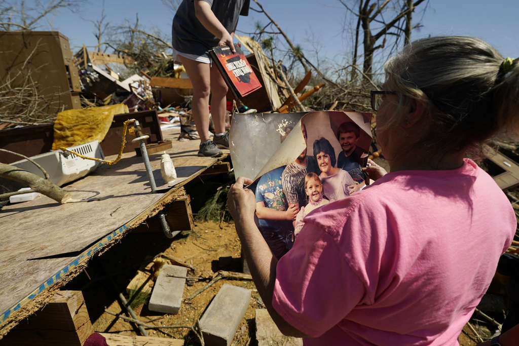 At least 39 dead after tornadoes, wildfires, dust storms wreak havoc across US