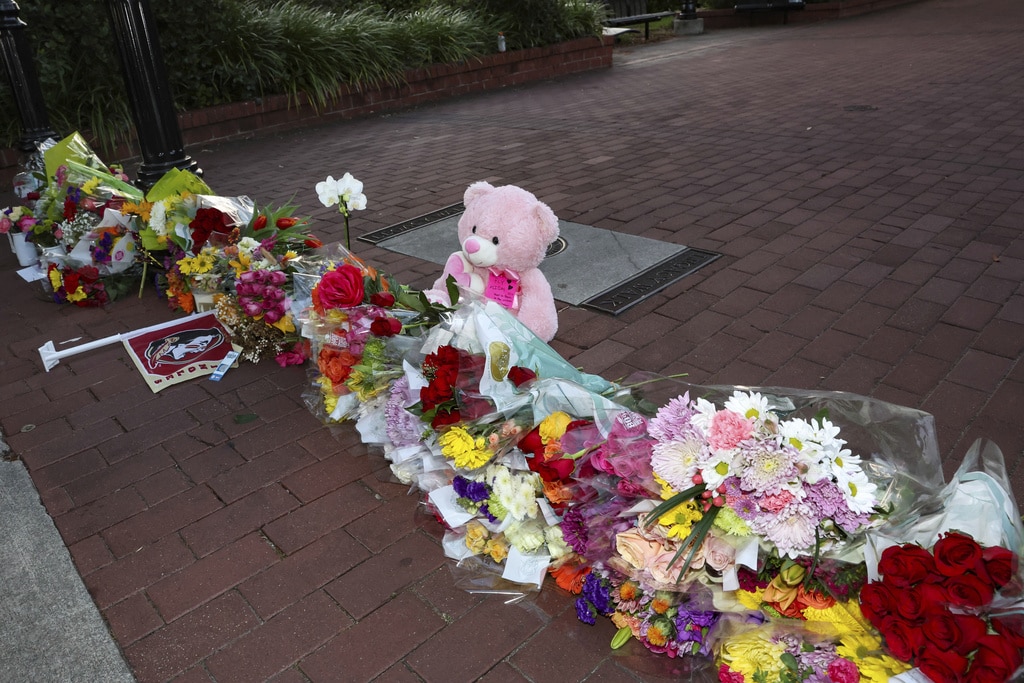 Florida gunman used deputy mom's former service weapon to kill 2 and wound 6