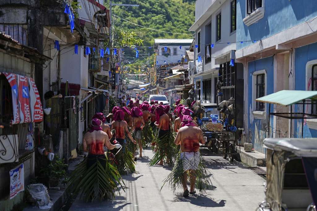 Devout in the PH mark Holy Week with flagellations, processions and passion play