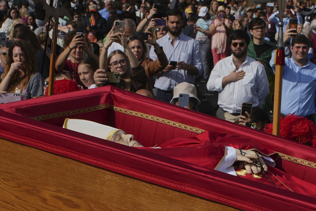 Catholic faithful pay their final respects to Pope Francis as public viewing begins