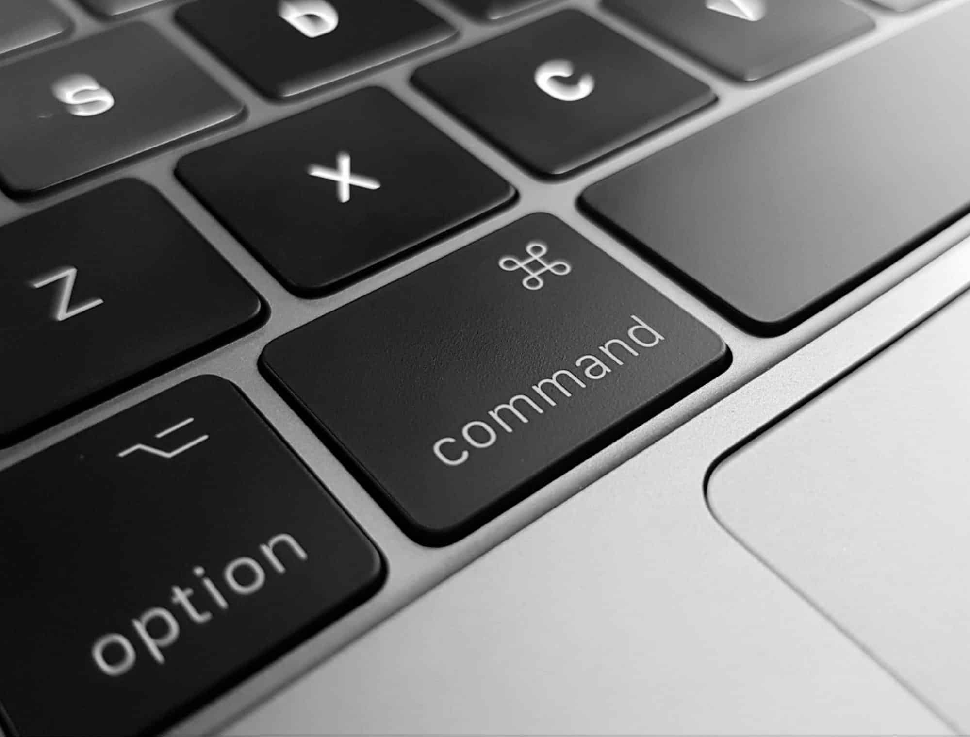 Close-up of a keyboard with focus on the command and option keys, symbolizing financial decision-making and loan options.