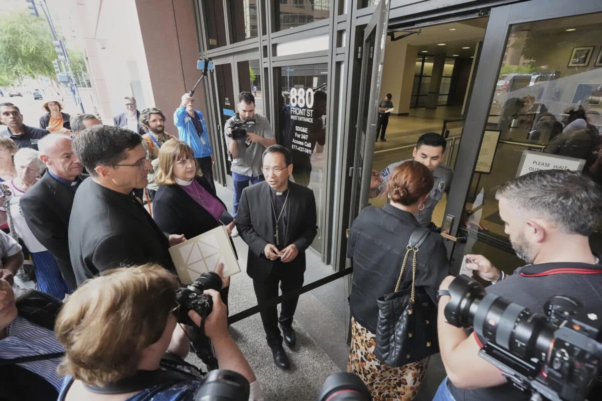 Bishop Micheal Pham, other clergy visit immigration court amid ICE raids
