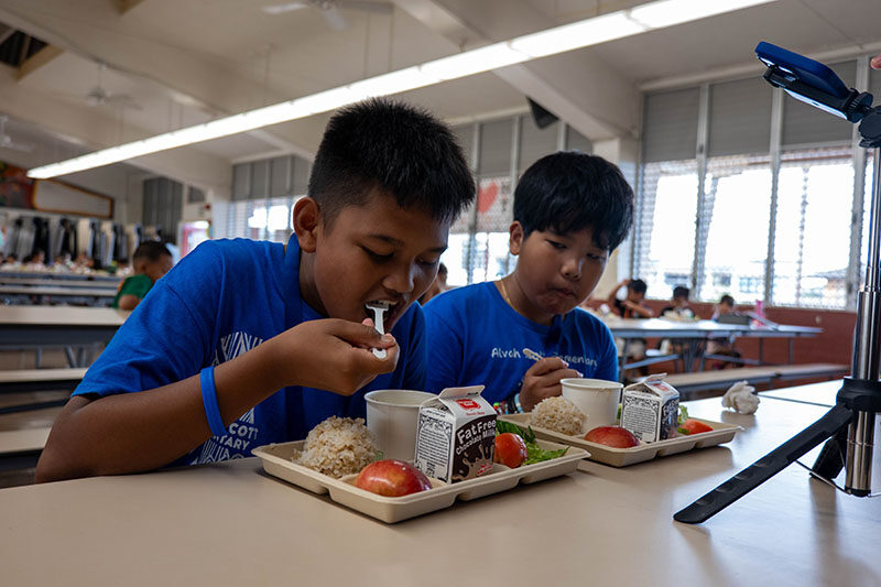 Students eating Tinolang Manok