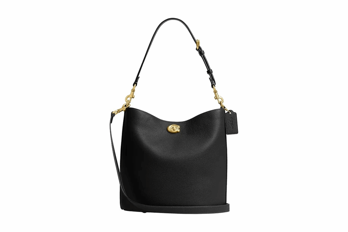 Black leather Coach Willow Soft Bucket Bag with gold hardware and adjustable strap.
