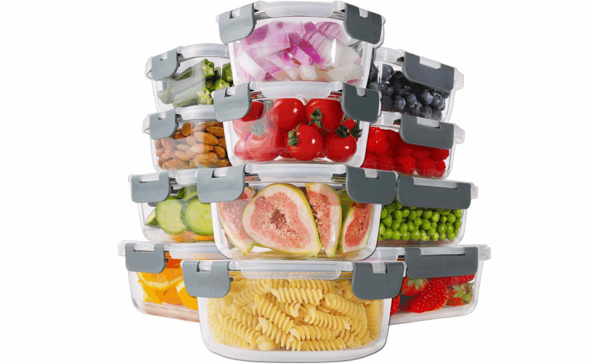 Stackable Homberking glass food storage containers filled with fruits, vegetables, and pasta.