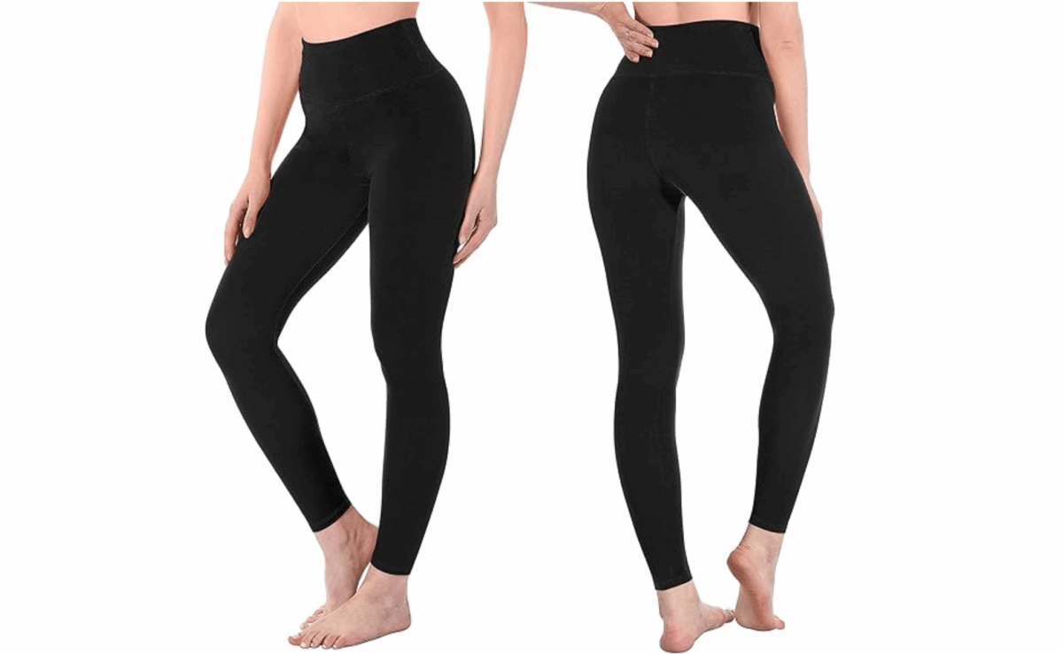 Black high-waisted leggings paired with white sneakers, ideal for workouts or casual wear.